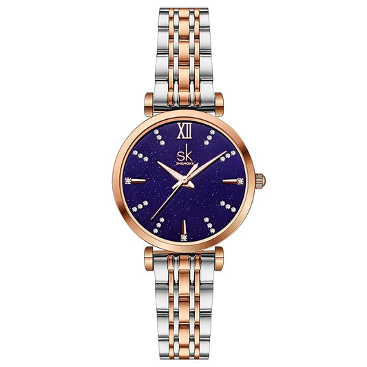 SHENGKE SK Klassische Frauen Uhren Mode Damen Kleid Uhr Solide Edelstahl Band Echtes Lederband (Blue-Starry)